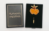 Broche Oncidium contour plaqué or